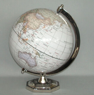 Rotating Pale Blue Globe on Polished Chrome Metal Base